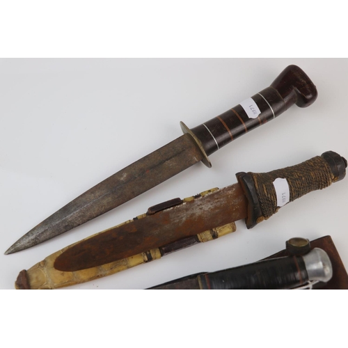 77 - A Collection Of Three Vintage Knives To Include A Sheath Knife And A Fighting / Trench Knife.