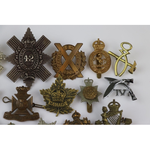 79 - A Collection Of Approx Twenty Five British Military Regimental Cap Badges To Include : The Northampt... 