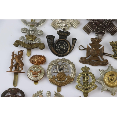 79 - A Collection Of Approx Twenty Five British Military Regimental Cap Badges To Include : The Northampt... 