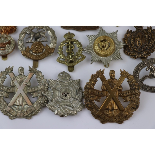 79 - A Collection Of Approx Twenty Five British Military Regimental Cap Badges To Include : The Northampt... 