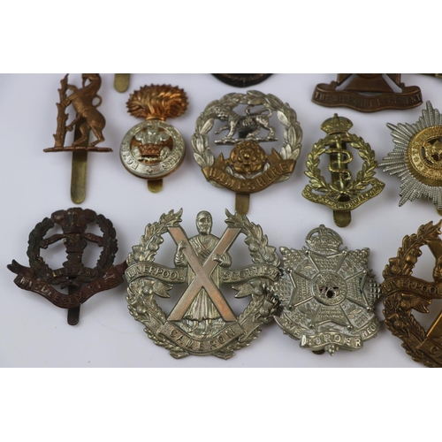 79 - A Collection Of Approx Twenty Five British Military Regimental Cap Badges To Include : The Northampt... 