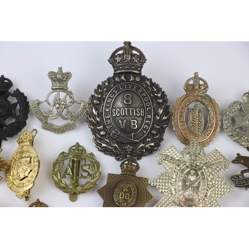 81 - A Collection Of Approx Twenty Five British Military Regimental Cap Badges To Include : The Tank Corp... 