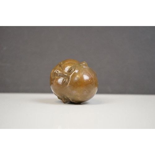 174 - A small bronze four faced Buddha paper weight character marks to underside.