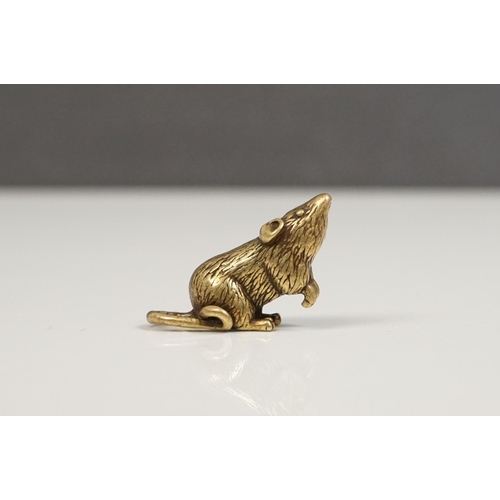 176 - A small brass figure of a mouse or rat.