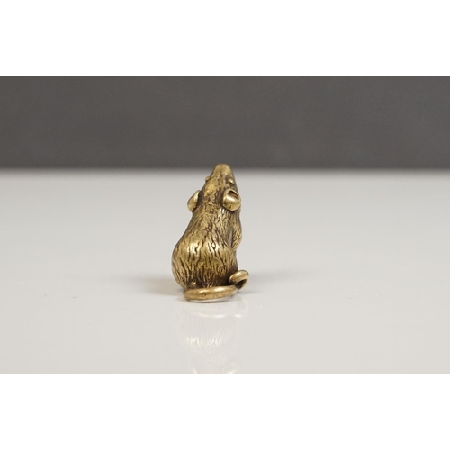 176 - A small brass figure of a mouse or rat.