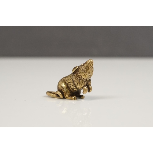 176 - A small brass figure of a mouse or rat.