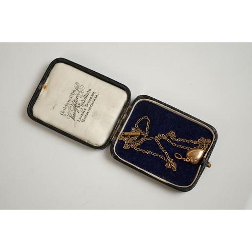 298 - A vintage starburst brooch together with a heart pendant.