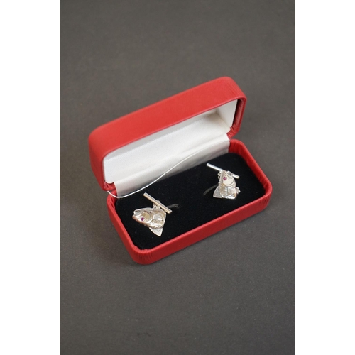 315 - Pair of silver fish head style cufflinks