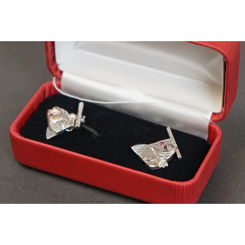 315 - Pair of silver fish head style cufflinks