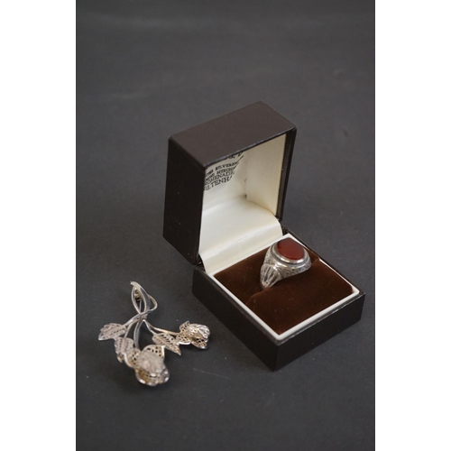 318 - Gentleman's Silver Ring set with an Oval Carnelian together with a Sterling Silver Brooch in the for... 