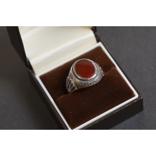 318 - Gentleman's Silver Ring set with an Oval Carnelian together with a Sterling Silver Brooch in the for... 