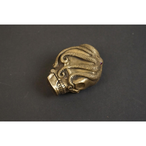 319 - Brass vesta case with skull and octopus