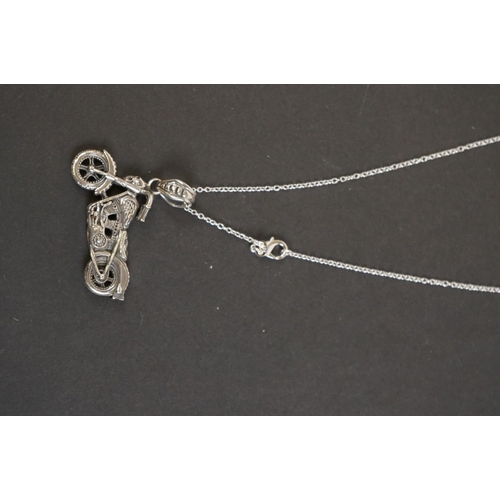 322 - Novelty silver pendant necklace of a Harley Davidson motorcycle