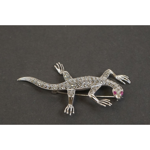 324 - Large silver marcasite lizard brooch with ruby eyes