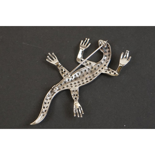 324 - Large silver marcasite lizard brooch with ruby eyes