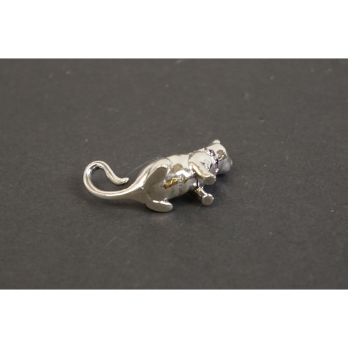 335 - Silver figure of a cat with ruby collar