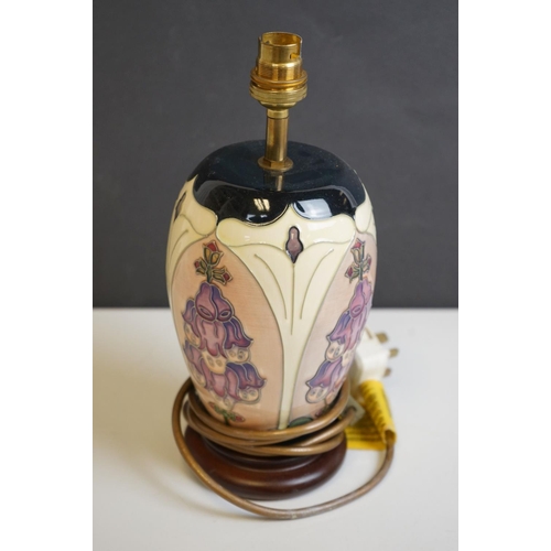 161 - Moorcroft Tube Lined Table Lamp with a Foxglove pattern, with silk shade, lamp 21cms high