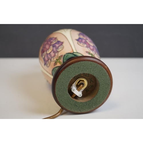 161 - Moorcroft Tube Lined Table Lamp with a Foxglove pattern, with silk shade, lamp 21cms high