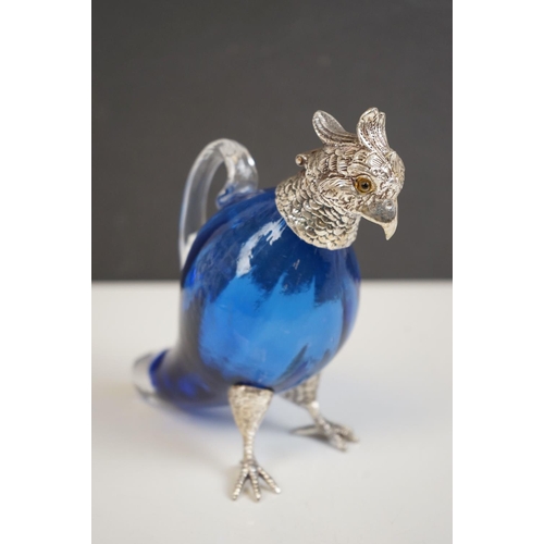 347 - Faceted blue glass decanter in the form of a game bird