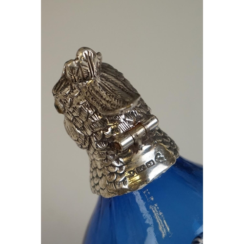 347 - Faceted blue glass decanter in the form of a game bird