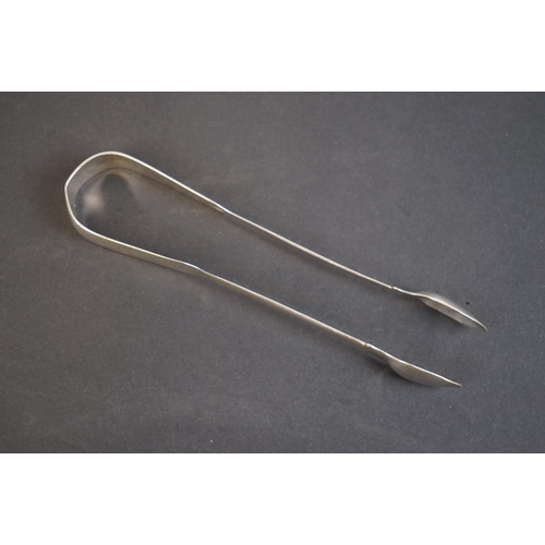 350 - A pair of fully hallmarked Georgian sterling silver sugar tongs.