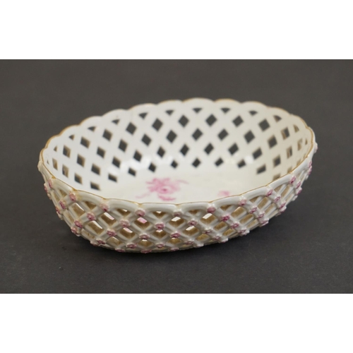 352 - A 19th century Meissen bonbon dish with pierced decoration and floral pattern