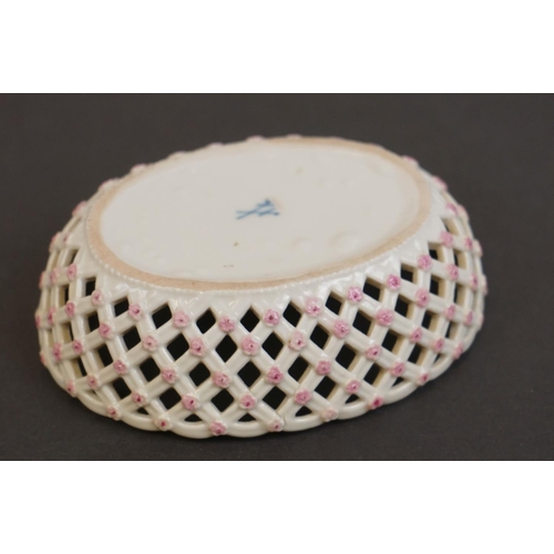 352 - A 19th century Meissen bonbon dish with pierced decoration and floral pattern