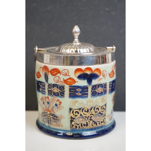 353 - Ceramic ironstone red biscuit barrel with silver plated mounts