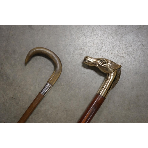 365 - Walking Stick with a Brass Handle in the form of a Horse Head together with another Walking Stick wi... 