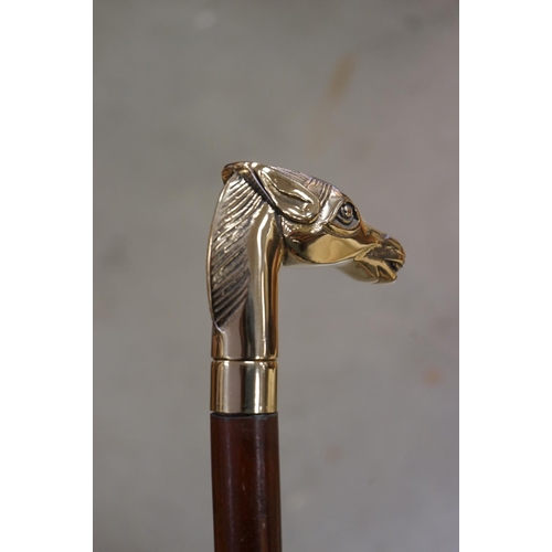 365 - Walking Stick with a Brass Handle in the form of a Horse Head together with another Walking Stick wi... 