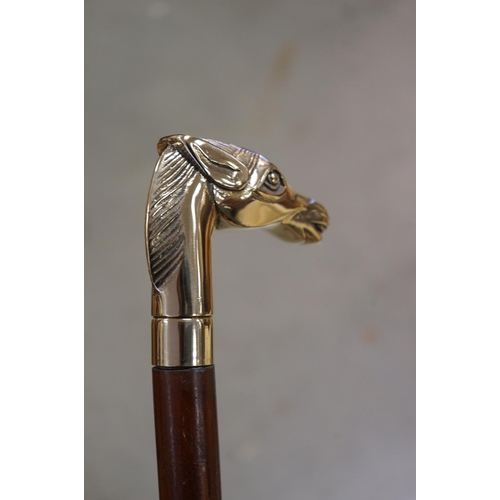 365 - Walking Stick with a Brass Handle in the form of a Horse Head together with another Walking Stick wi... 