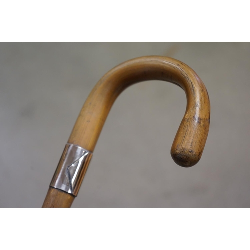 367 - Walking Stick with Racing Car Handle together with another Walking Stick