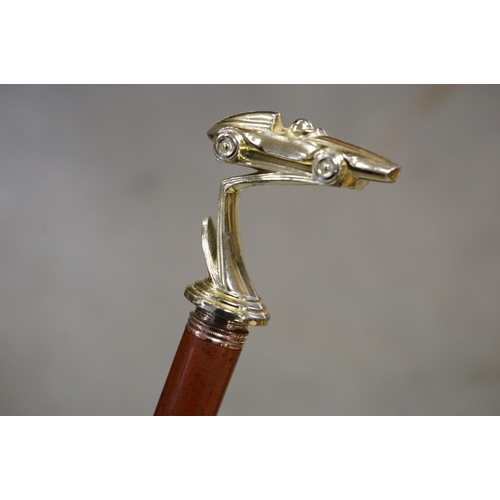 367 - Walking Stick with Racing Car Handle together with another Walking Stick