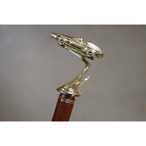 367 - Walking Stick with Racing Car Handle together with another Walking Stick