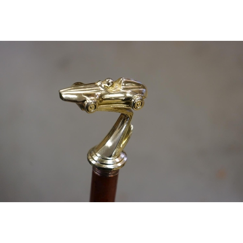 367 - Walking Stick with Racing Car Handle together with another Walking Stick