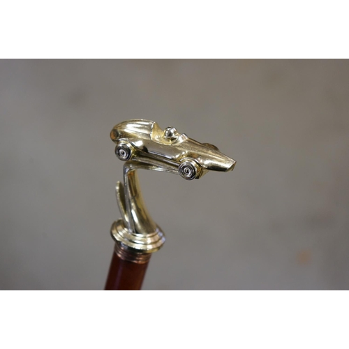367 - Walking Stick with Racing Car Handle together with another Walking Stick
