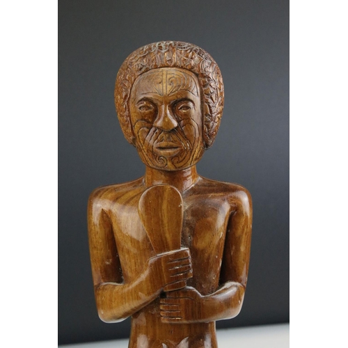 101 - Carved Hardwood Figure of a Maori Warrior with Club, 32cms high