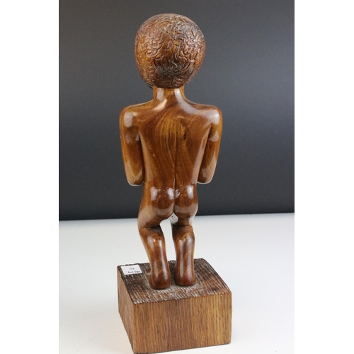101 - Carved Hardwood Figure of a Maori Warrior with Club, 32cms high