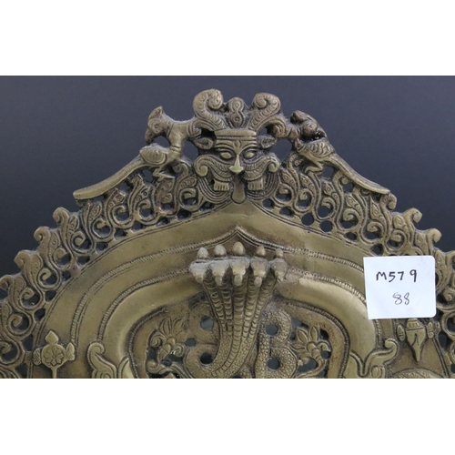 110 - Indian Brass Ornate Pierced Plaque / Picture Frame in the form of a open door surmounted by an arch ... 