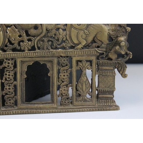 110 - Indian Brass Ornate Pierced Plaque / Picture Frame in the form of a open door surmounted by an arch ... 