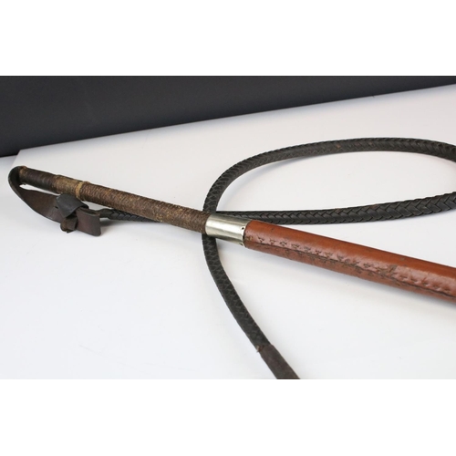 149 - Early 20th century Huntsman's Whip, the Antler Handle with Makers Button, Leather Covered Grip and L... 