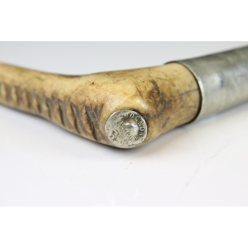 149 - Early 20th century Huntsman's Whip, the Antler Handle with Makers Button, Leather Covered Grip and L... 