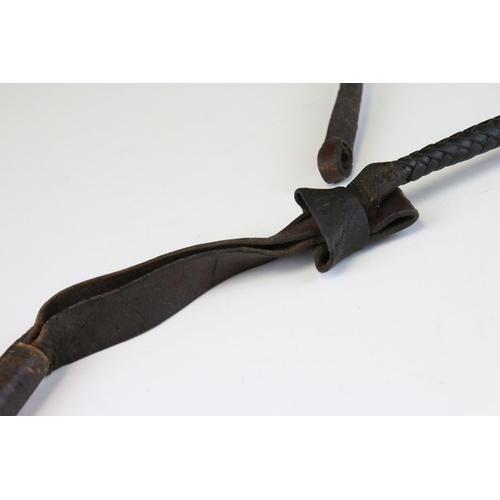 149 - Early 20th century Huntsman's Whip, the Antler Handle with Makers Button, Leather Covered Grip and L... 