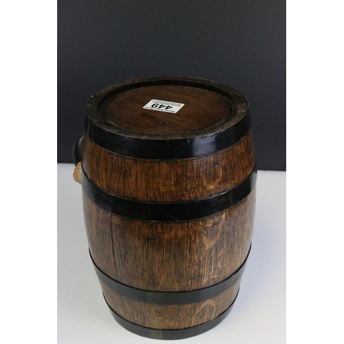 449 - Oak and metal banded barrel with handle and cork stopper