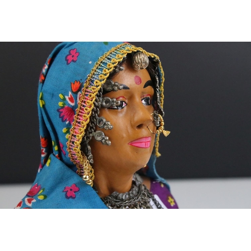 452 - A bust of an indian woman in traditional costume.
