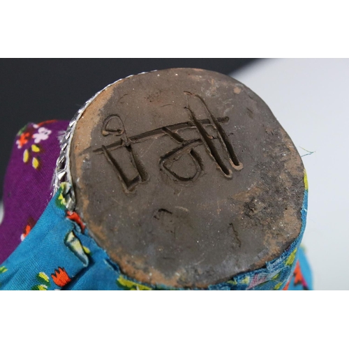 452 - A bust of an indian woman in traditional costume.