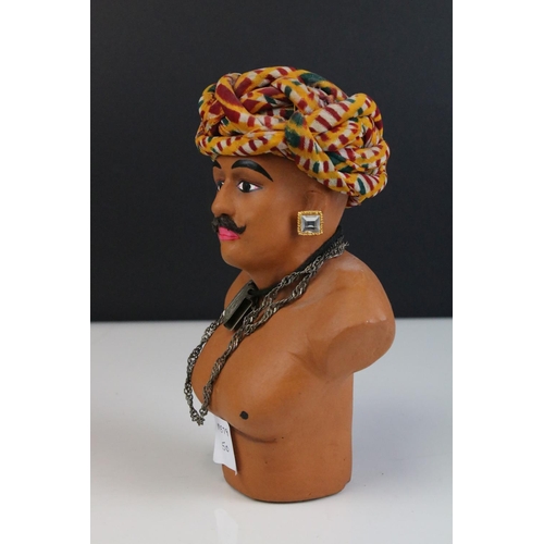 454 - A bust of an Indian man in traditional costume.