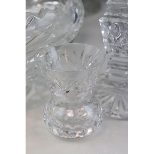 461 - A large collection of mainly crystal cut glass to include vases, bowls and glasses.