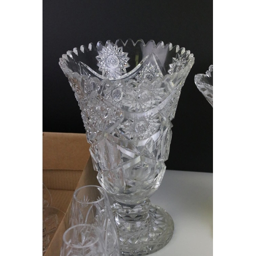 461 - A large collection of mainly crystal cut glass to include vases, bowls and glasses.