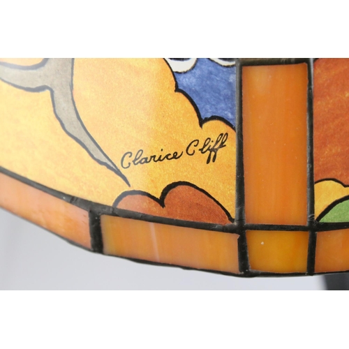 66 - Clarice Cliff printed glass lampshade, in Tiffany style, on twin bulb Corinthian style metal table l... 